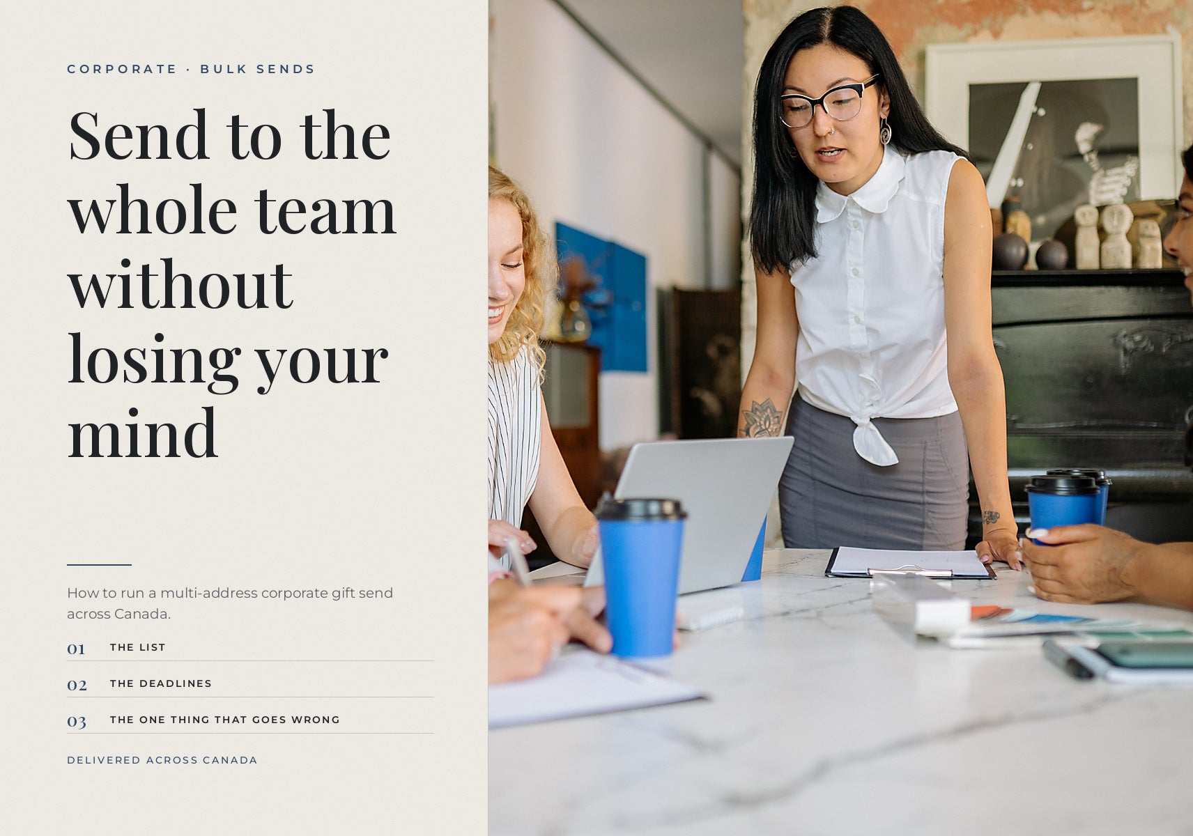Colleagues collaborating around a meeting table with laptops and coffee cups.