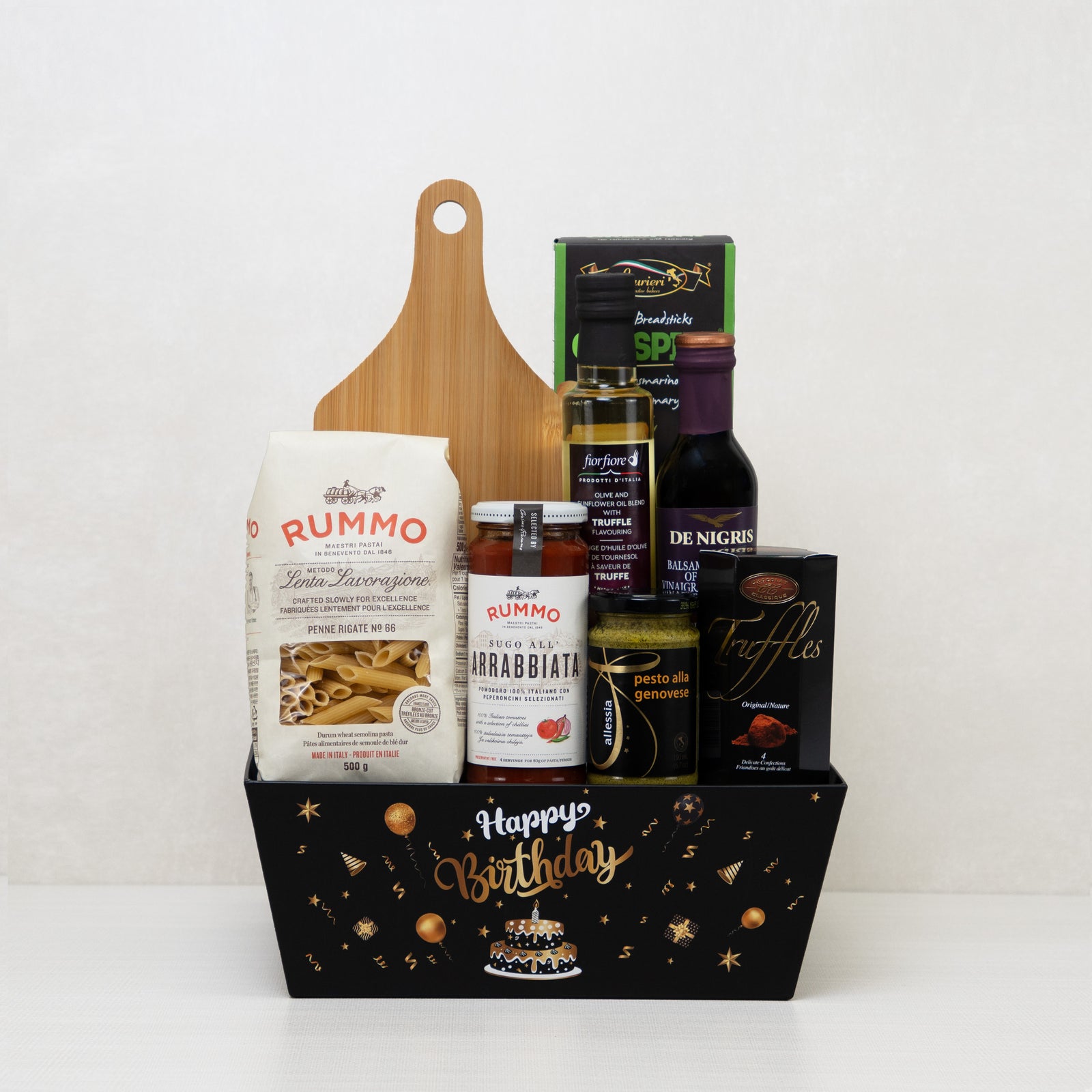 Birthday Pasta Night Basket, which includes pasta, a board, breadsticks, truffles, and more.