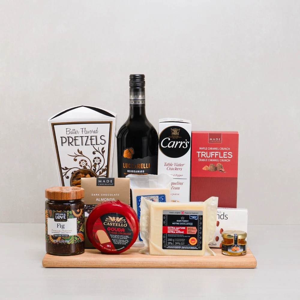 A gourmet gift hamper with wine, cheese and chocolate curated for a special recipient
