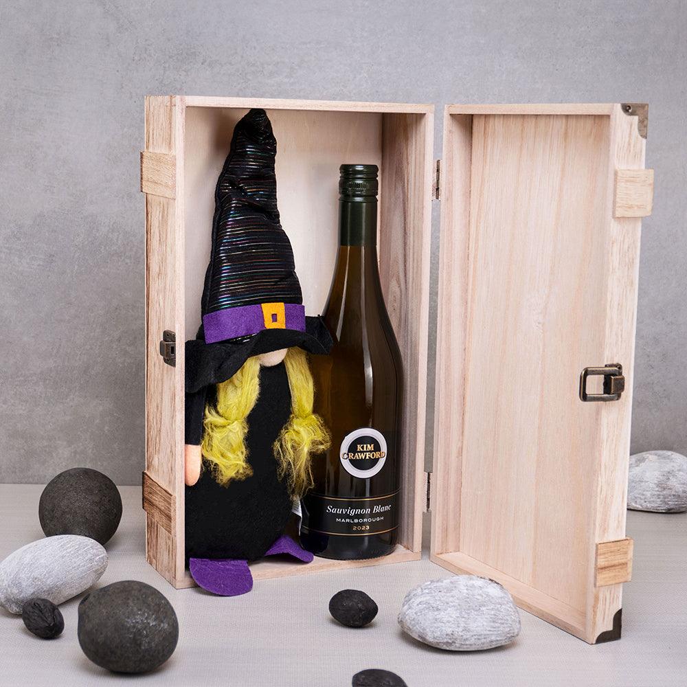 Witching Hour Wine Gift Box with Kim Crawford Sauvignon Blanc and a witch hat gnome plush in an open hinged wooden case