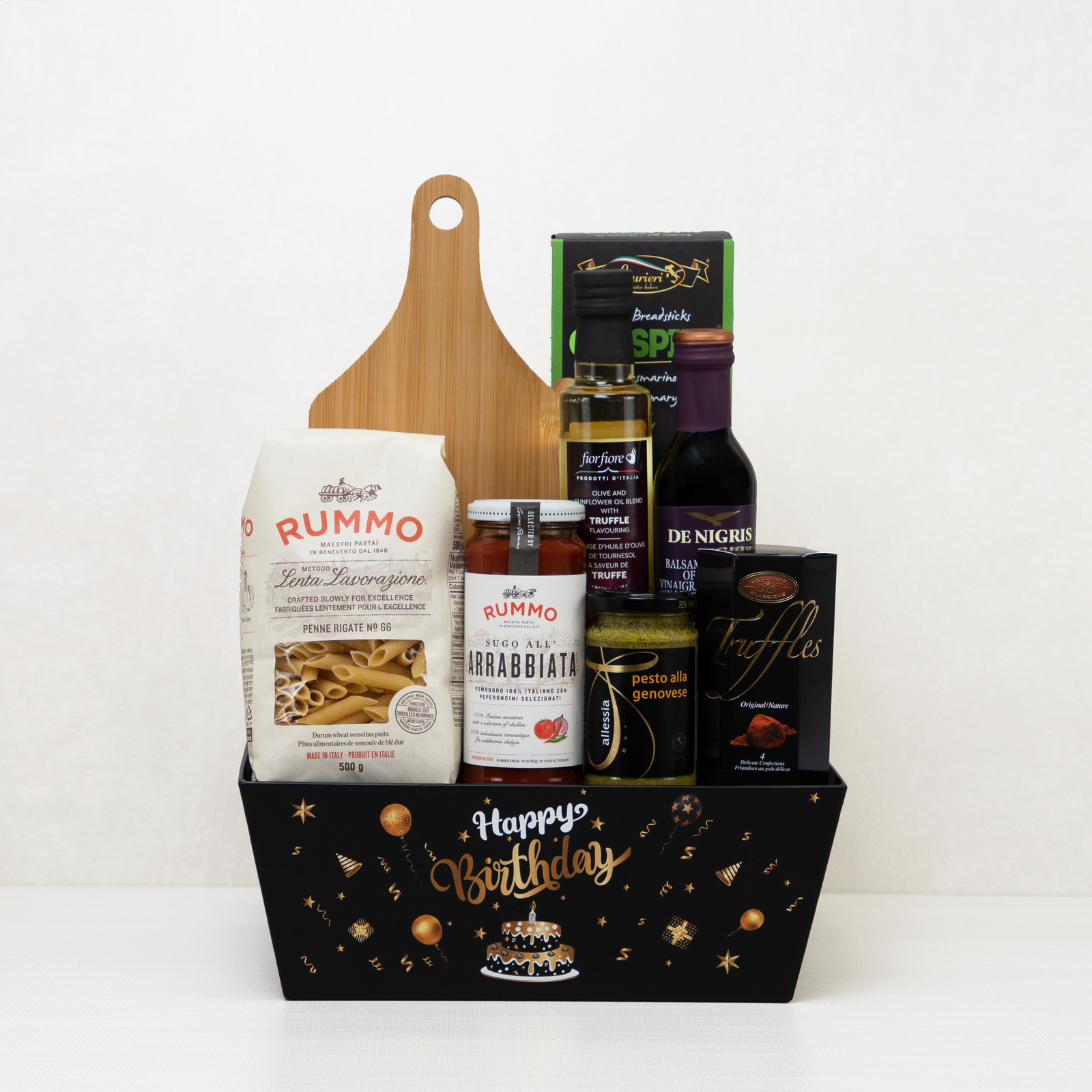 Birthday Pasta Night Basket, which includes pasta, a board, breadsticks, truffles, and more.