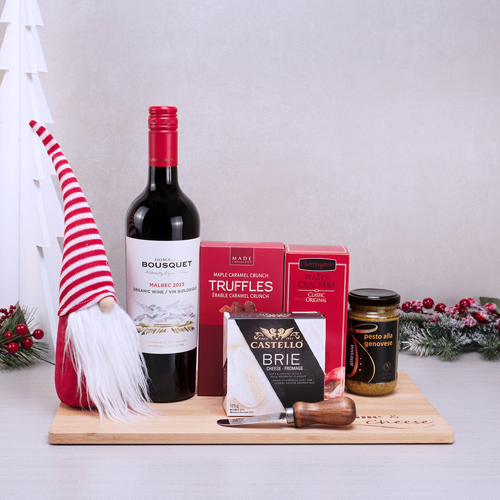 Festive Santa’s Wine, Cheese & Truffles Hamper with Malbec, a striped-hat gnome, Castello brie, pesto and caramel truffles