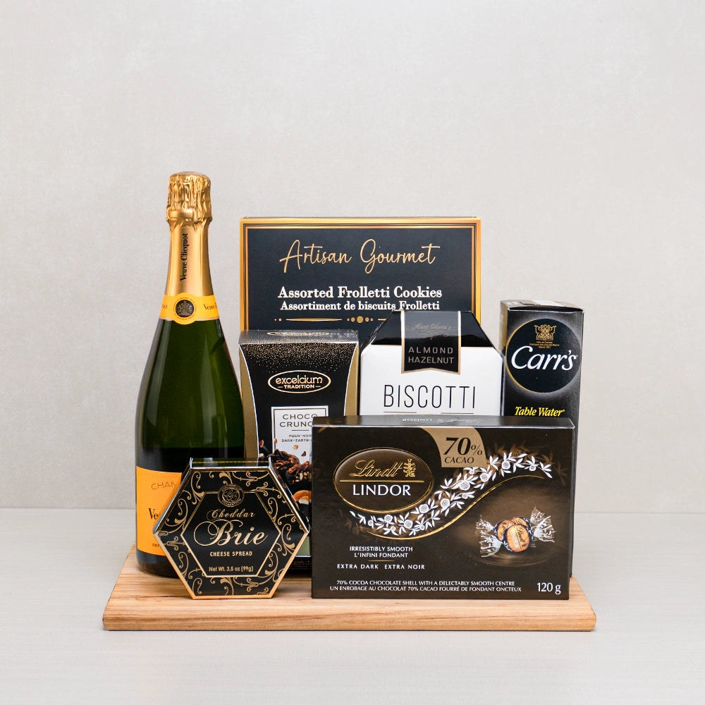 Corporate gift basket with branded messaging, gourmet treats and champagne