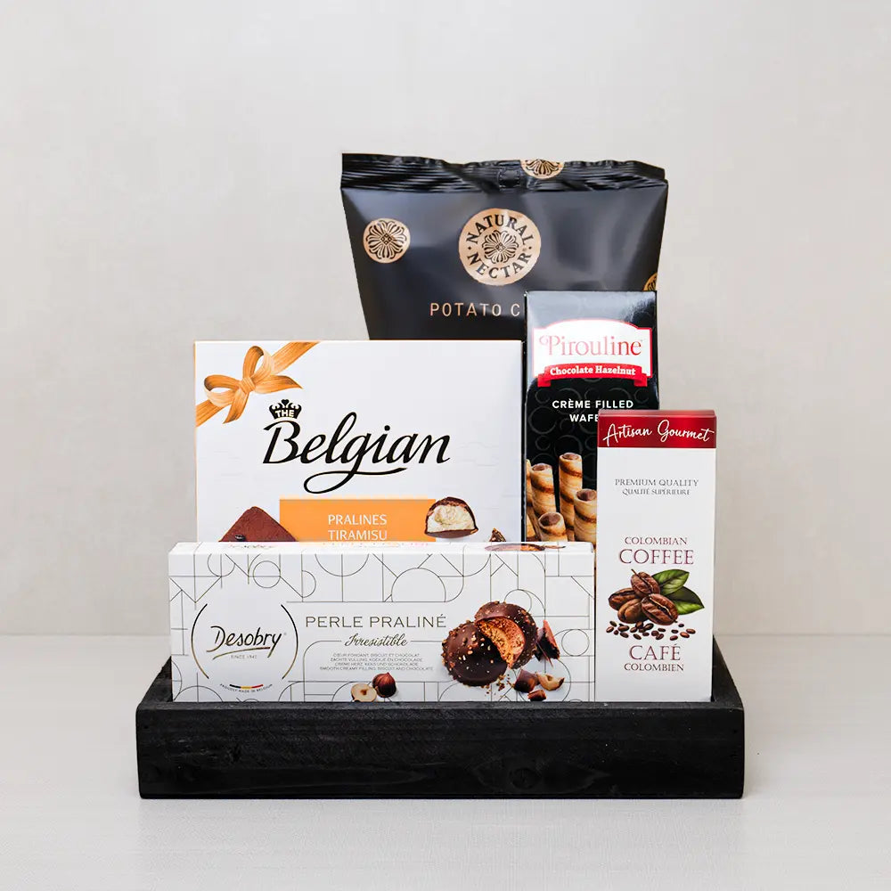Tasty Birthday Surprise Basket with Belgian tiramisu pralines, Desobry cookies, Pirouline wafers and coffee on a black tray