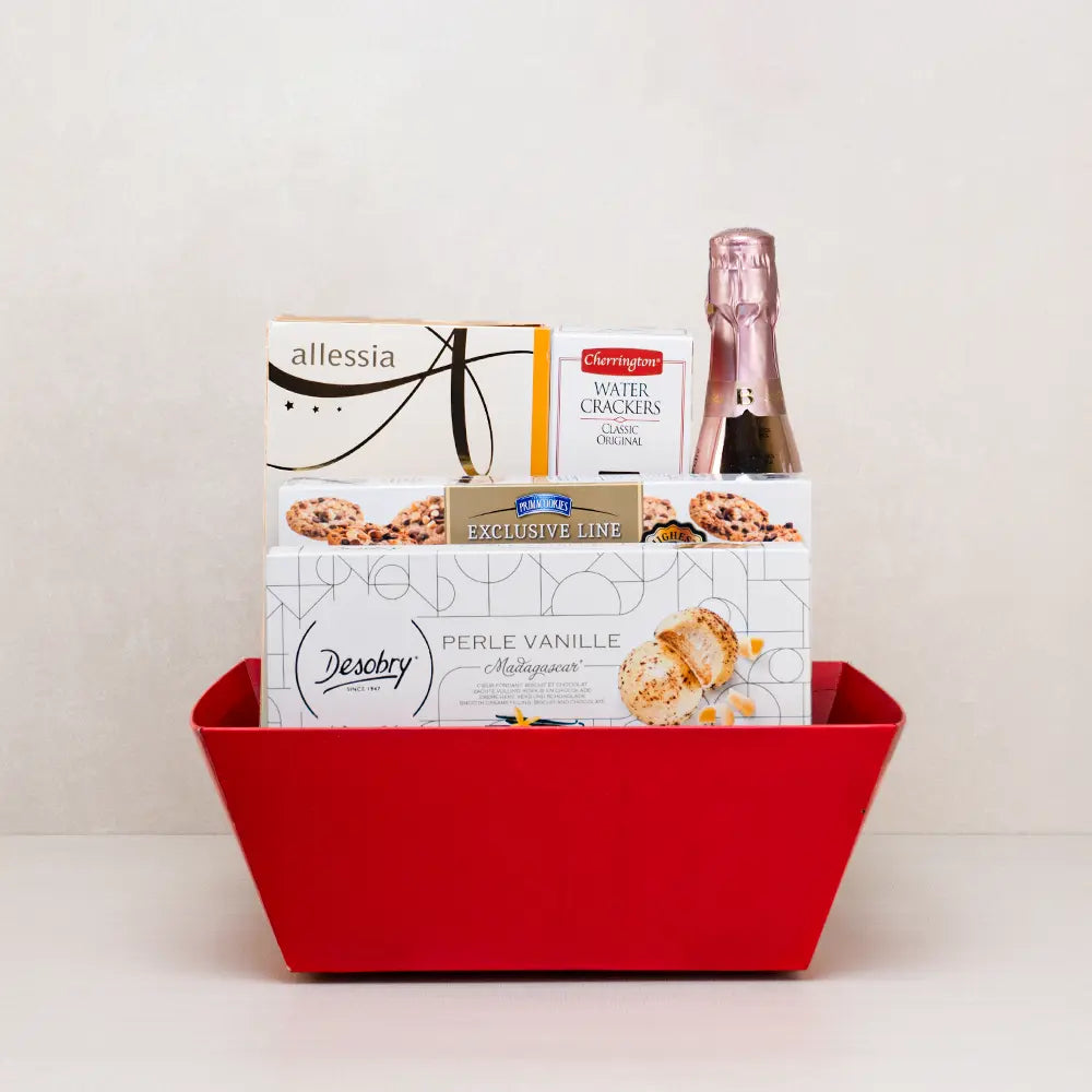 Rosé Glow & Gourmet Treats gift basket in red with mini sparkling rosé, Allessia biscotti, Desobry biscuits and cookies