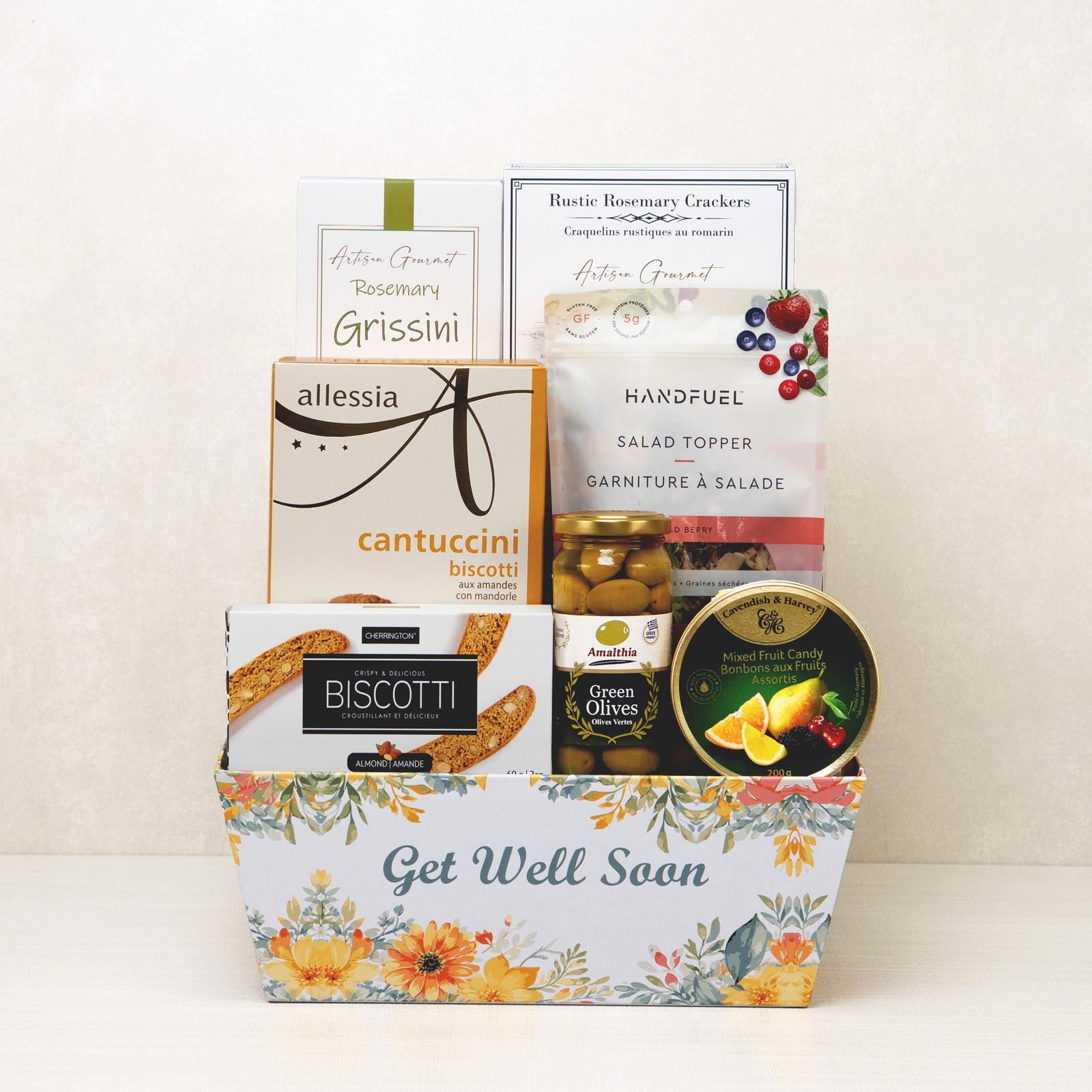 Get Well Goodies Basket with breadsticks, crackers, biscotti, olives, and mixed fruit drops.
