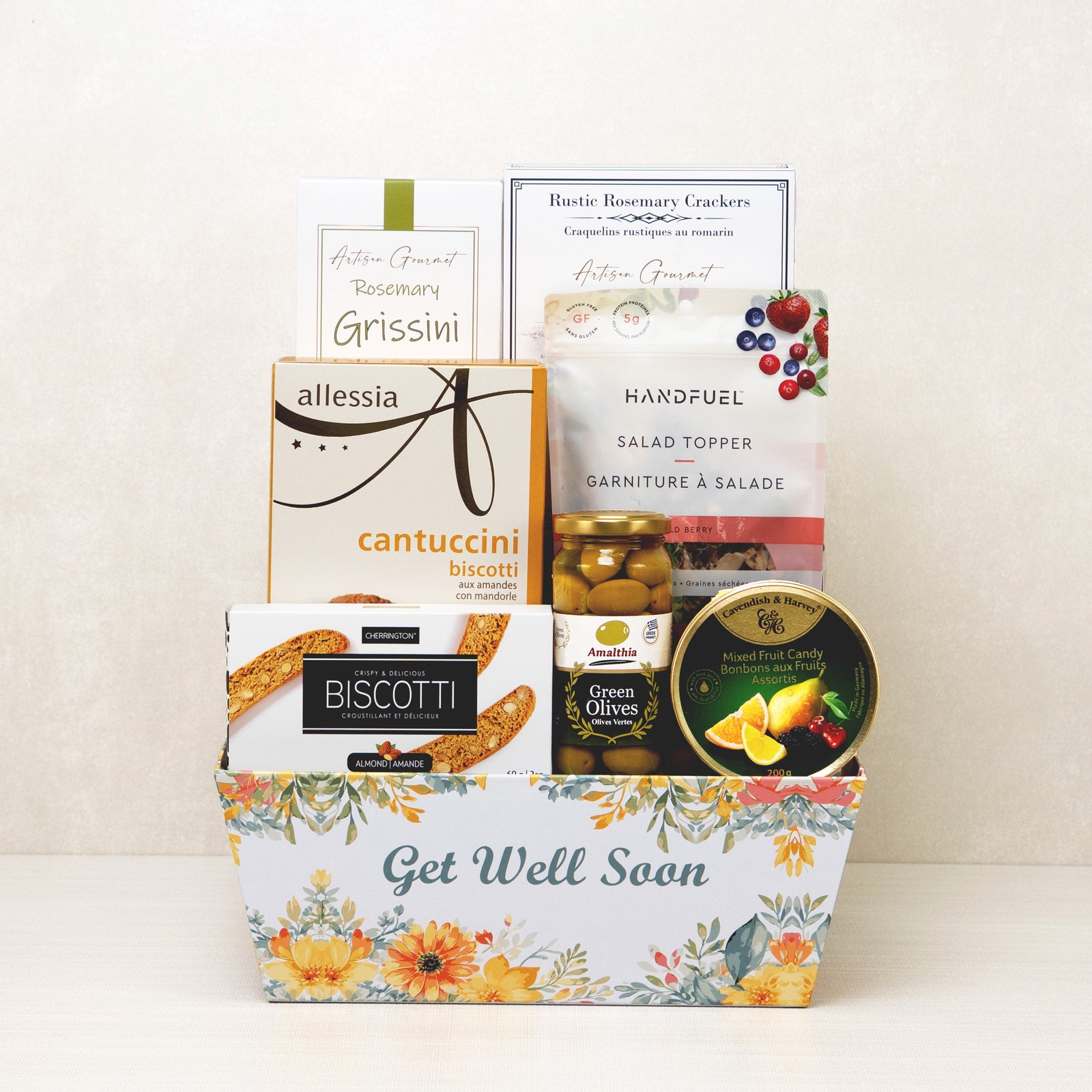 Get Well Goodies Basket with breadsticks, crackers, biscotti, olives, and mixed fruit drops.