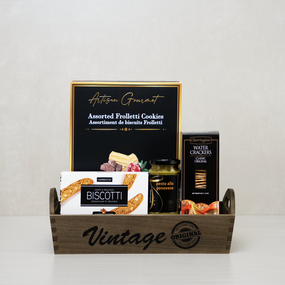 Gourmet Snack Vintage Tray of dark wood with Artisan Gourmet Frolletti cookies, almond biscotti, pesto and water crackers