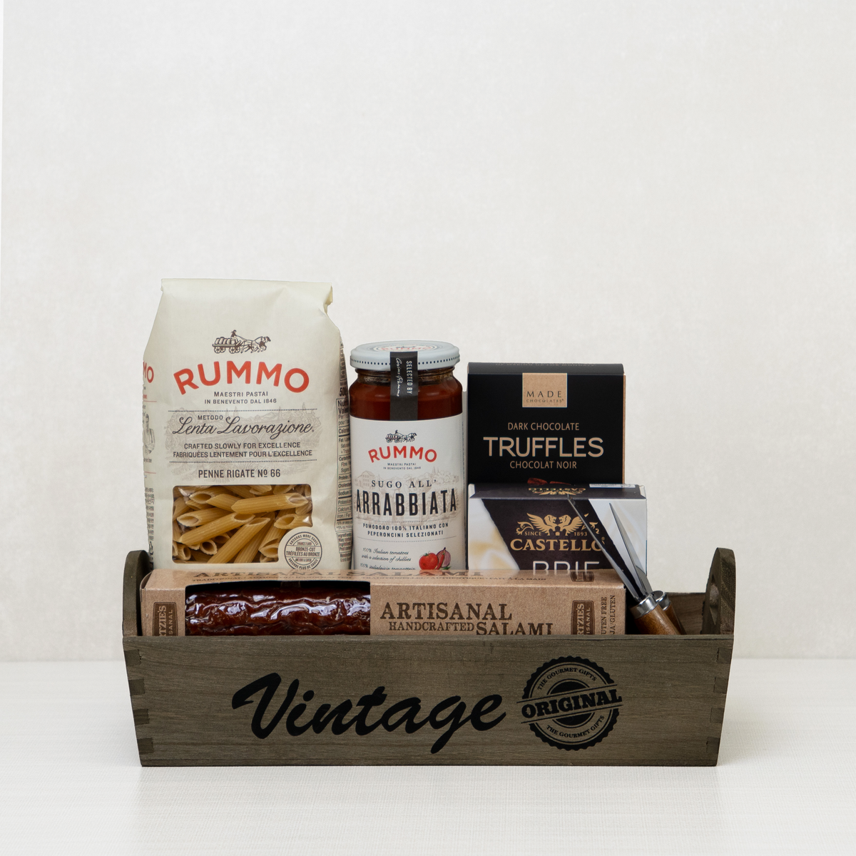 Italian Gourmet Vintage Tray with Rummo penne and arrabbiata sauce, salami, Castello brie and dark chocolate truffles
