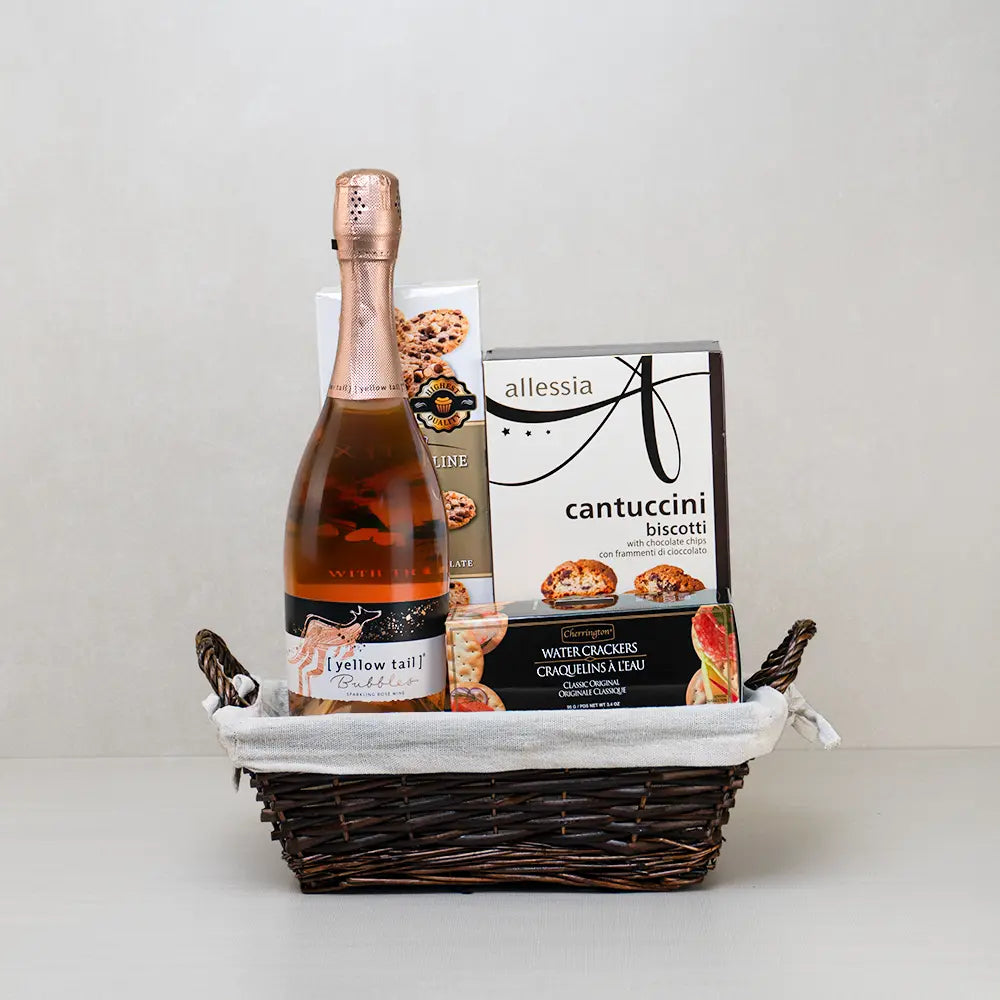 Soothing Delights Basket with Yellow Tail sparkling rosé, Allessia cantuccini, chocolate chip cookies and water crackers