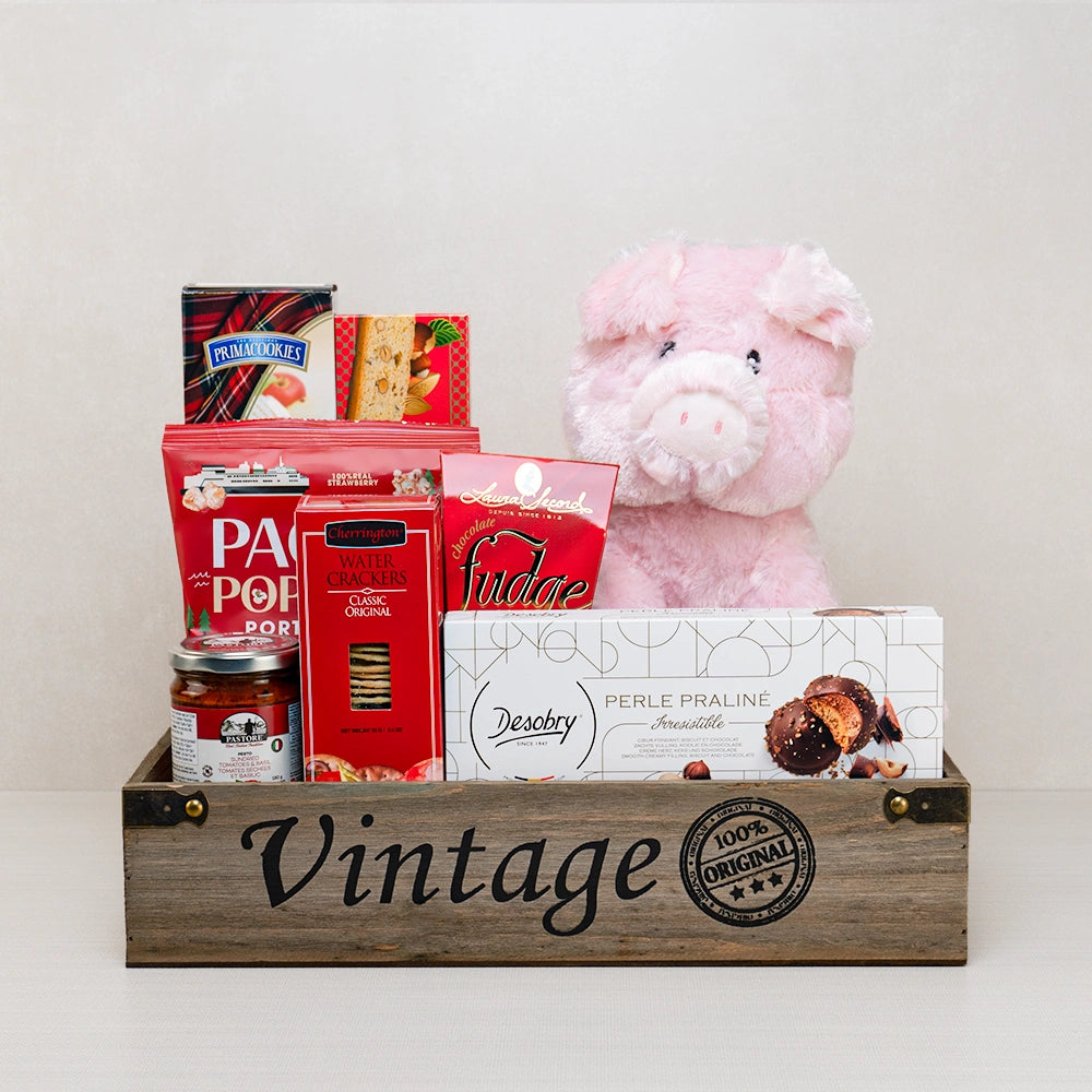 Wrapped in Love Heart Basket with a pink pig plush, Desobry praliné cookies, Laura Secord fudge and strawberry popcorn