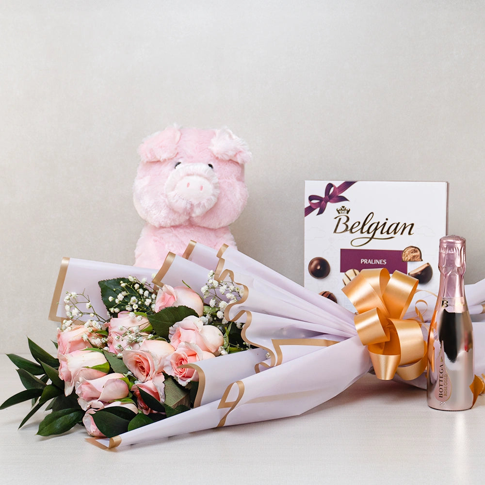 Sweetheart’s Belgian Chocolate Delight gift set with a pink rose bouquet, pig plush, Belgian pralines and mini Bottega rosé