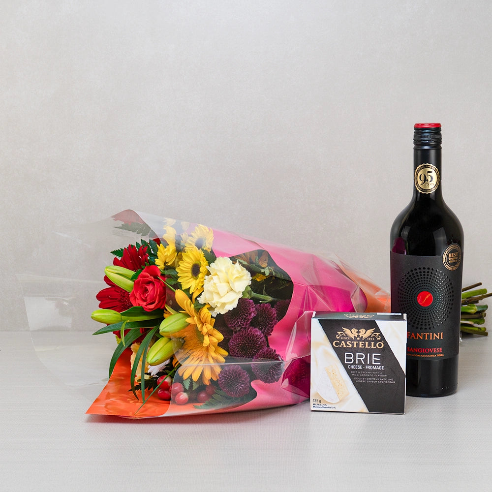 Cheese, Wine & Floral Bliss gift set with Fantini Sangiovese, Castello brie and a bouquet of roses, lilies and sunflowers