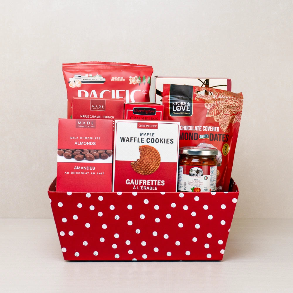 Sweetheart Surprise Basket in red polka dots with strawberry popcorn, chocolate almond stuffed dates and waffle cookies