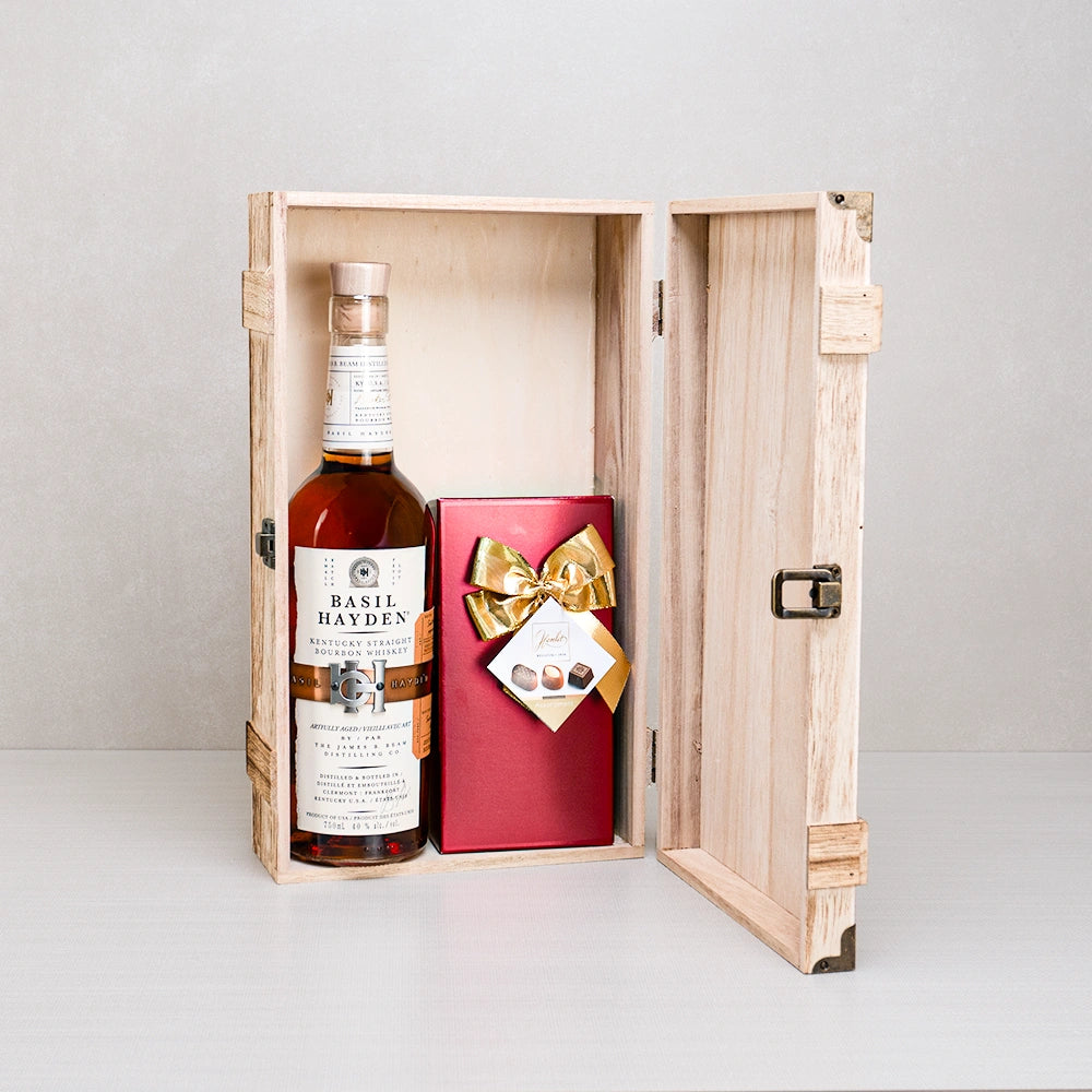 Premier Liquors & Chocolate Gift Box: Basil Hayden bourbon and Hamlet Belgian chocolates with a gold bow in a hinged case