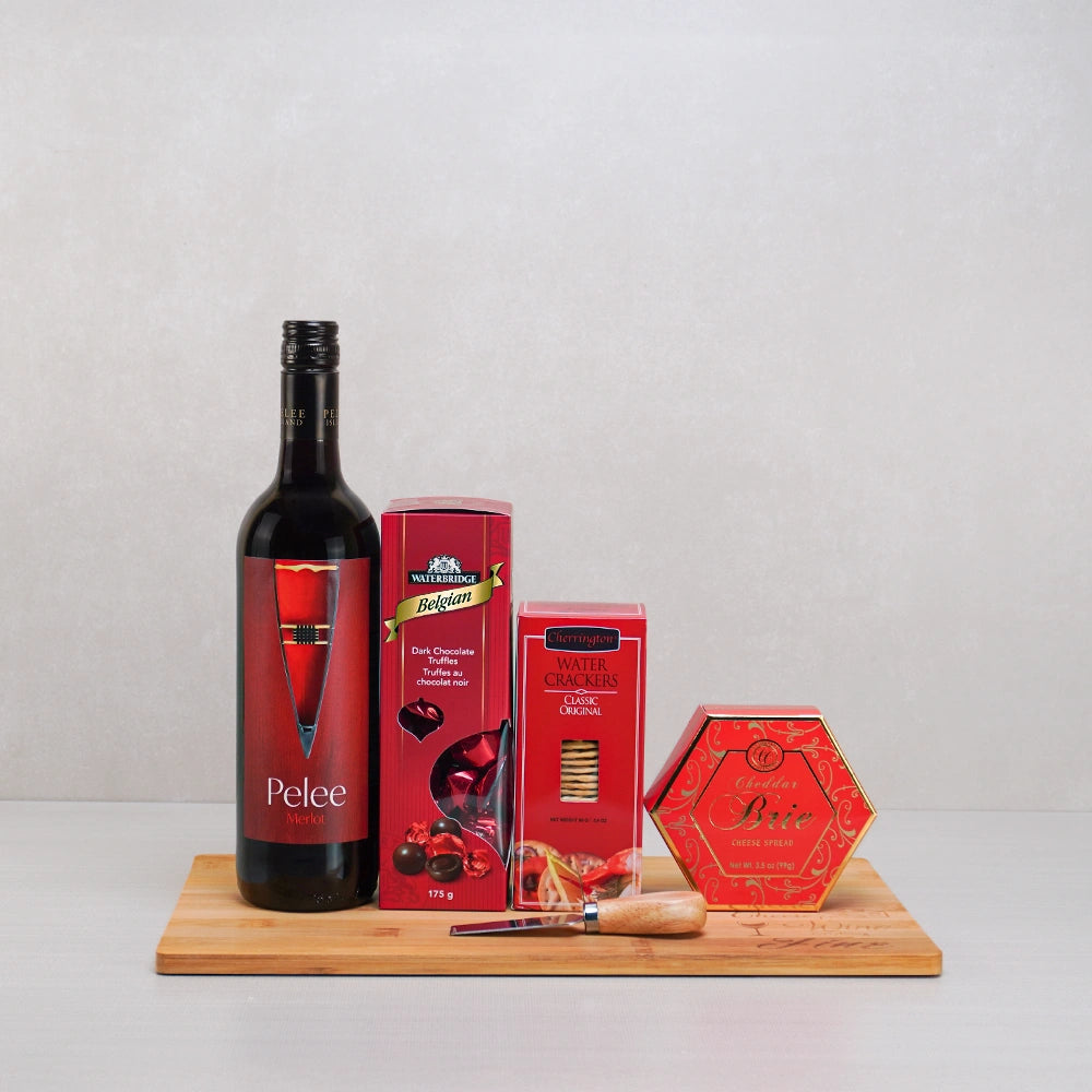 Luxurious Red Wine & Savory Treats gift set with Pelee Merlot, Belgian dark truffles, cheddar brie spread and a cheese knife