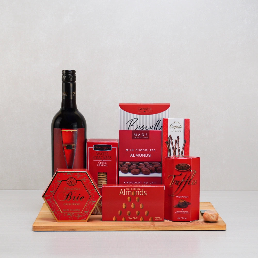The Red Velvet Gourmet Selection gift set with red wine, Cheddar Brie spread, maple biscotti and Cupido chocolate sticks