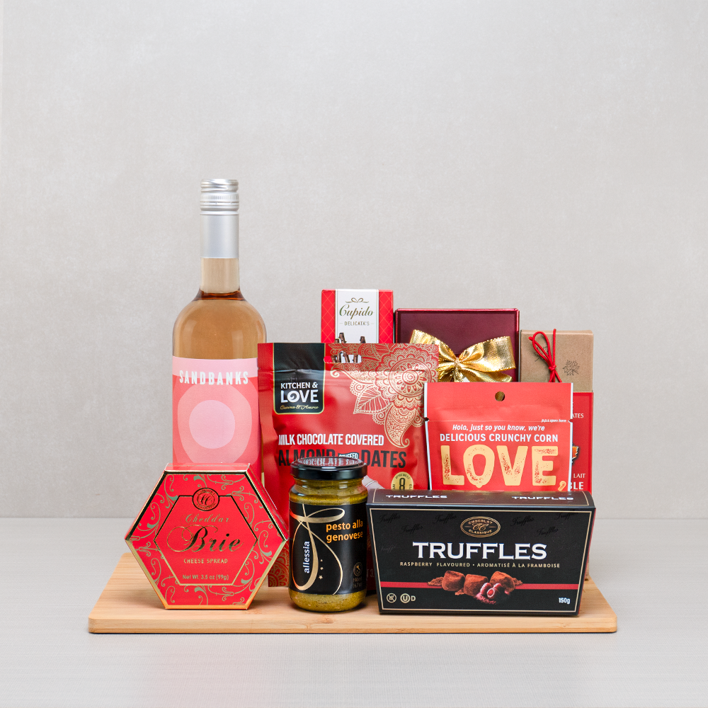 Date Night Indulgence Set with Sandbanks rosé, chocolate-covered dates, raspberry truffles, Love Corn and cheddar brie spread