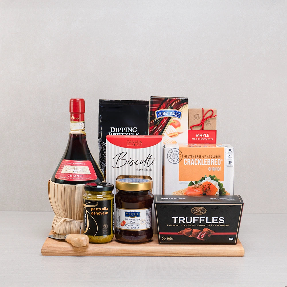 The Timeless Treasure Basket with Leonardo da Vinci Chianti in a straw fiasco, raspberry truffles, maple biscotti and pesto