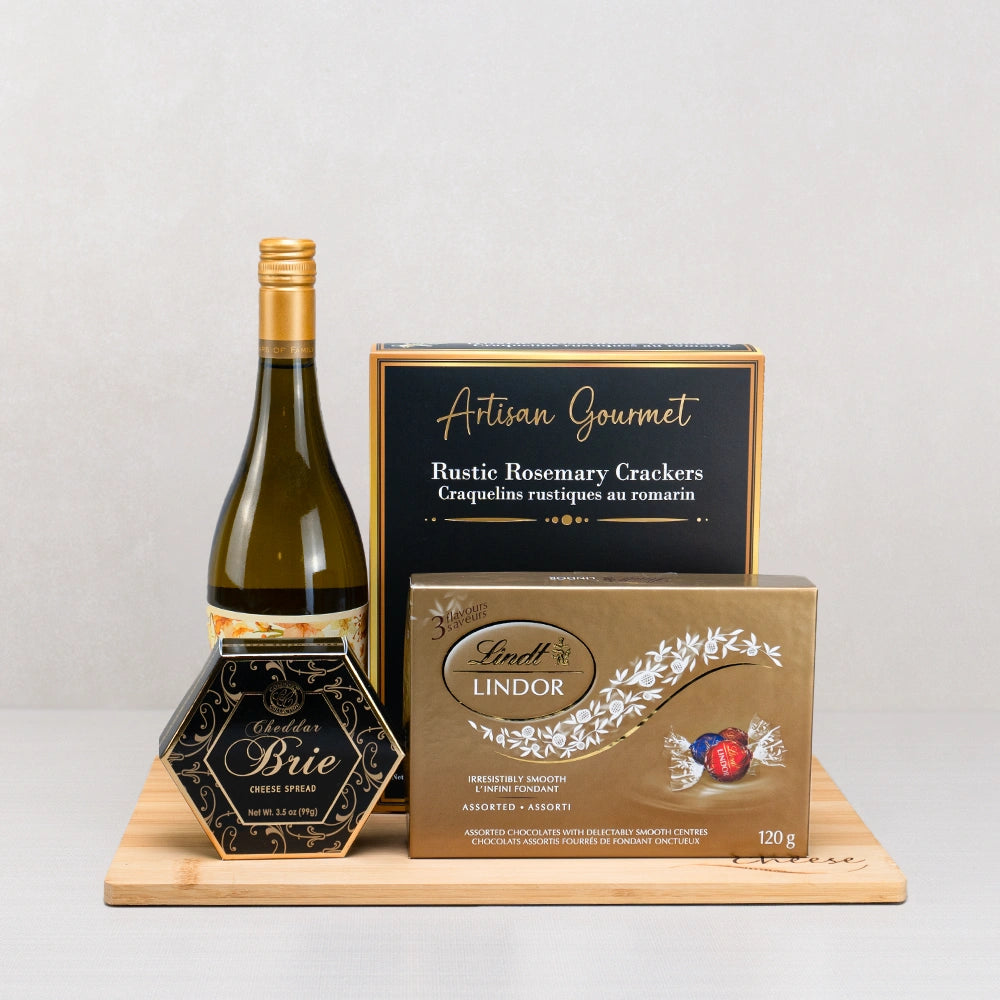 Signature Vintage Wine and Artisan Bites set: white wine, Lindt Lindor, rustic rosemary crackers and Cheddar Brie spread