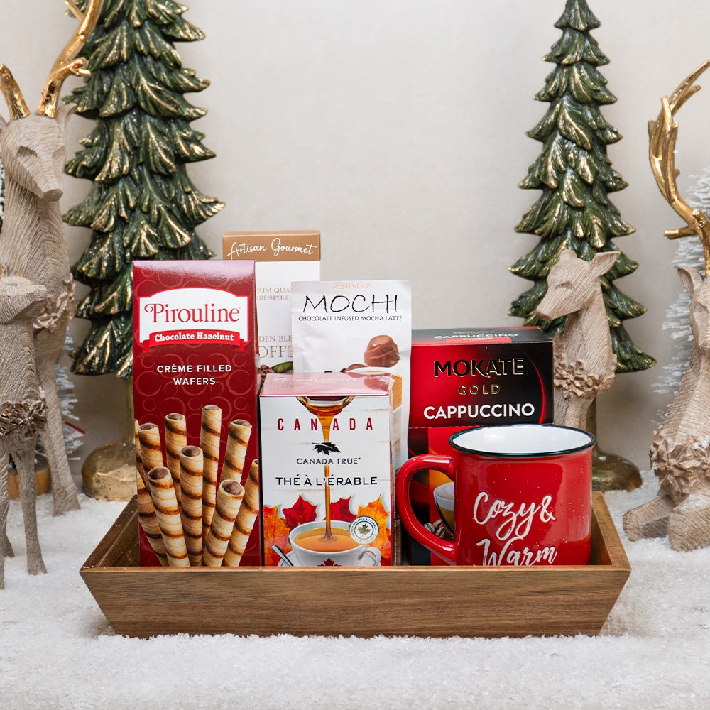 Snowy Morning Basket with a red Cozy and Warm mug, Pirouline wafers, maple tea and Mokate cappuccino in a wood tray