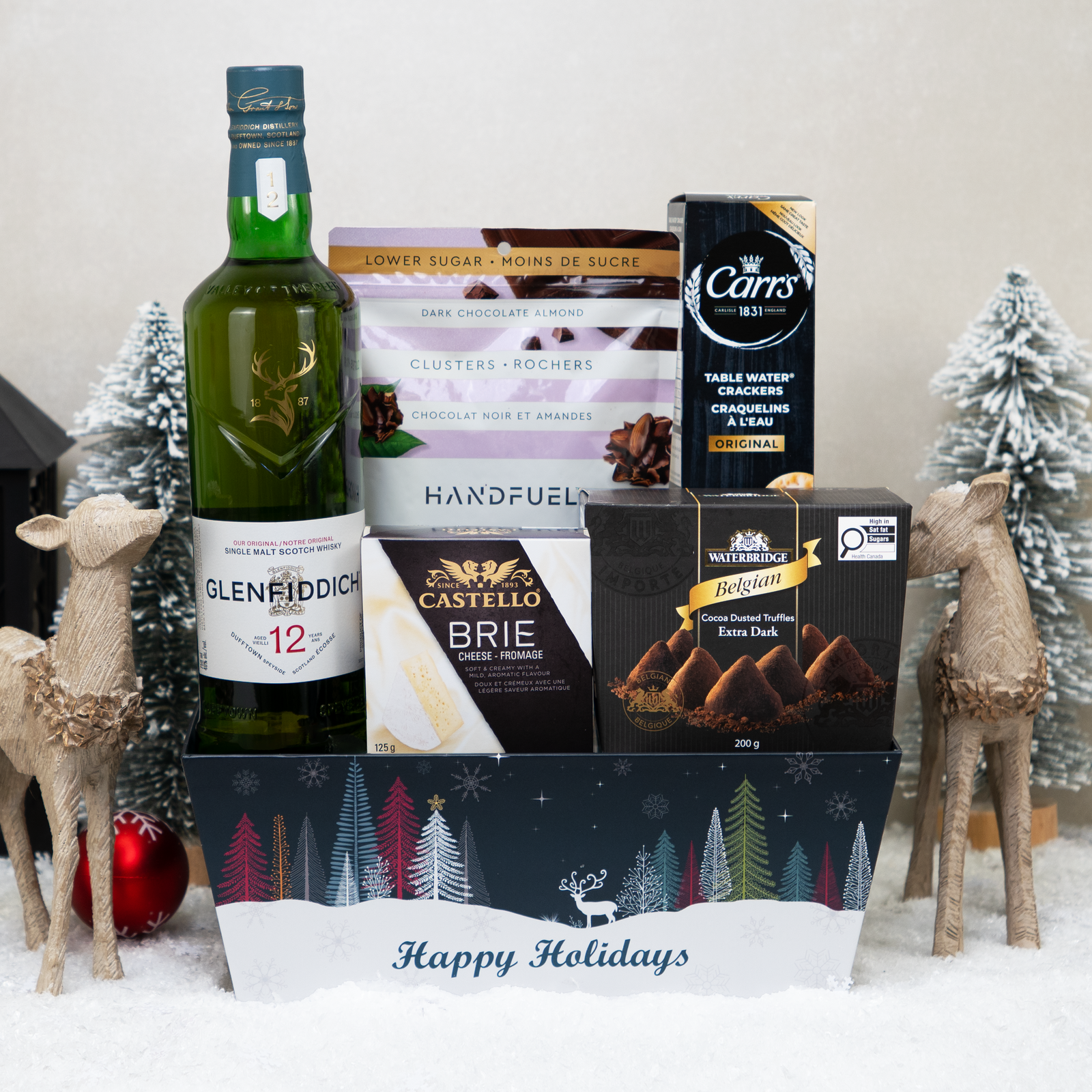 Winter Reserve Whisky Gift Basket with whisky, cheese, crackers, truffles, and almond clusters.