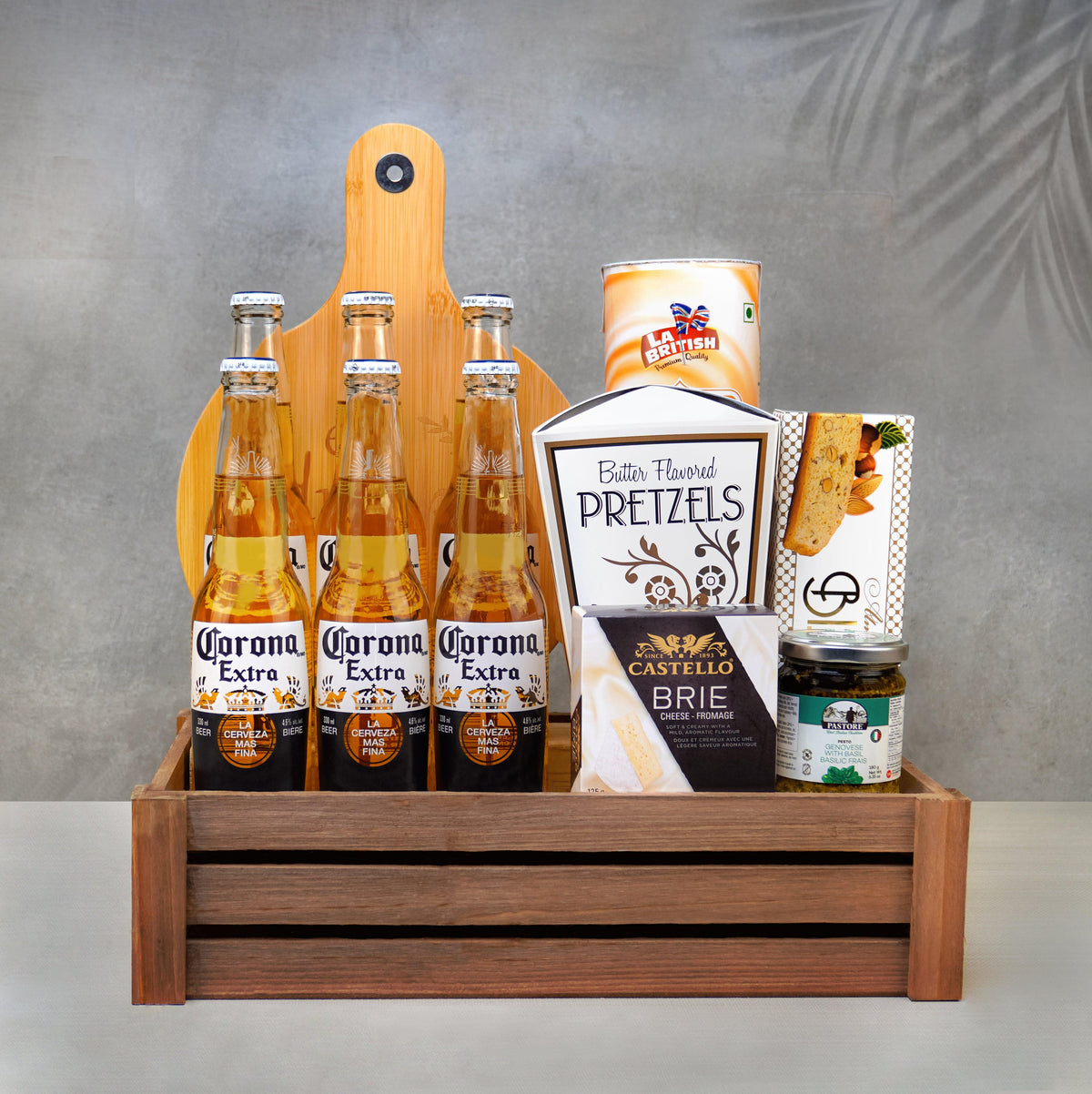 Corona & Snack Favorites Basket: six Corona Extra beers, Castello brie, butter pretzels and wafer rolls in a wood crate