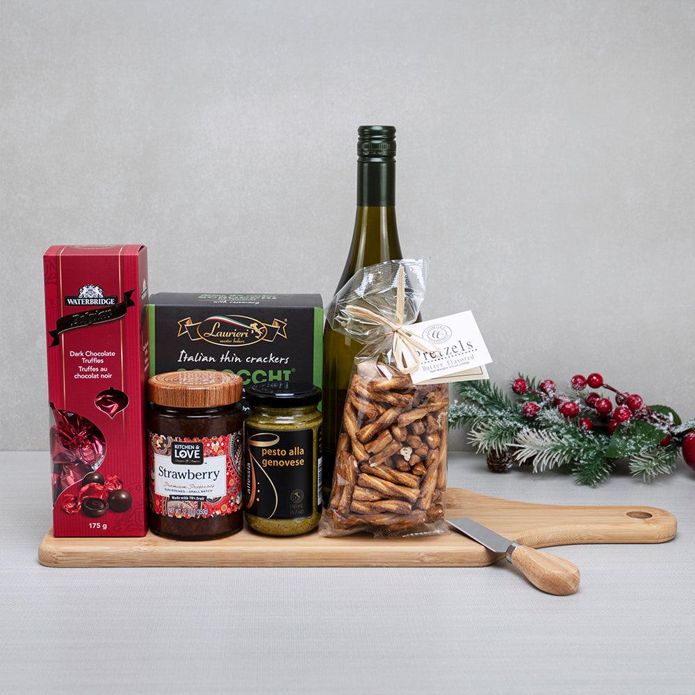 Holiday Wine & Savory Pretzel Treats gift set: white wine, butter pretzels, Waterbridge truffles and pesto on a paddle board