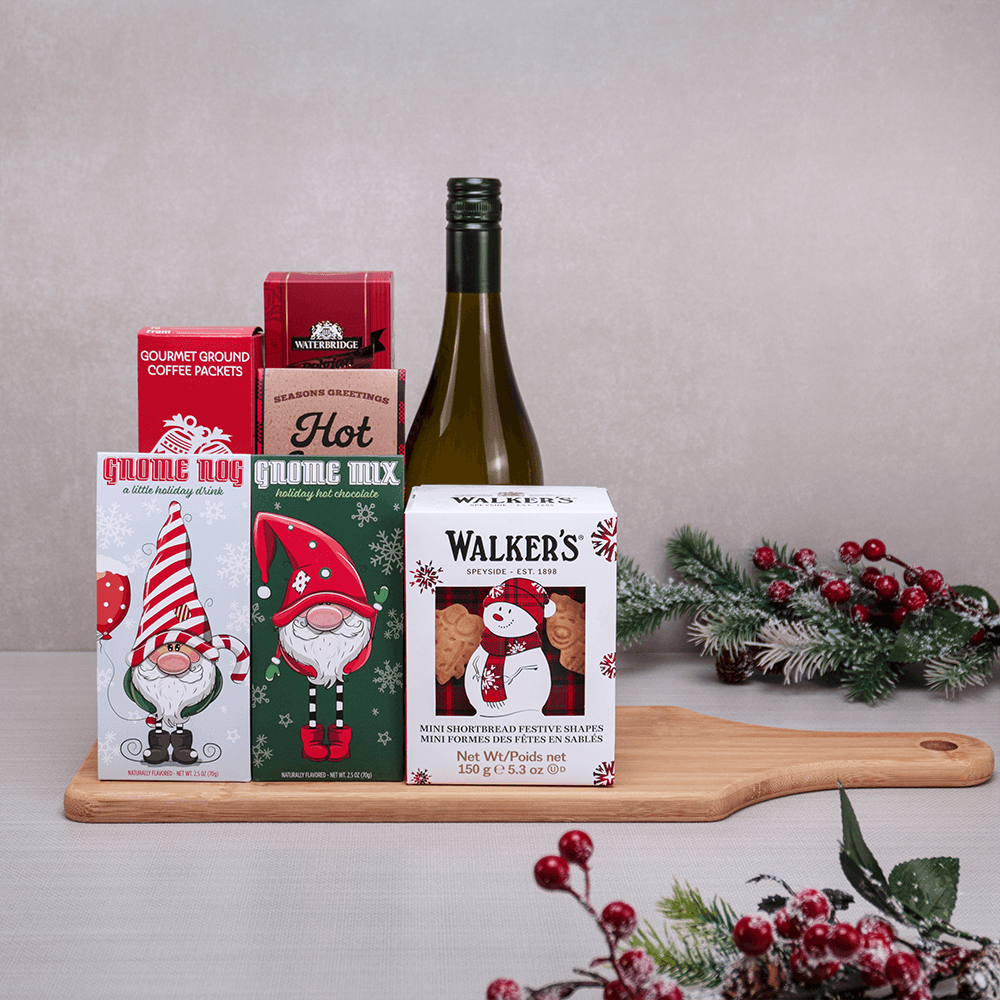The Gnome's Cozy Evening Gift Set with white wine, Gnome Nog, gnome hot chocolate, Walker's shortbread and coffee on a board