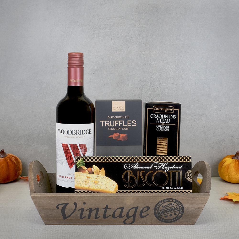 The Vintage Delight Wine Basket with Woodbridge Cabernet Sauvignon, MADE dark truffles and biscotti in a wooden Vintage tray